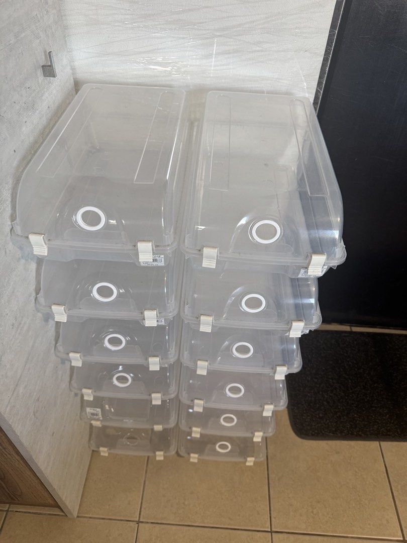 Clear Plastic Stackable Shoe Storage Boxes Set (Category: Storage Boxes & Baskets) located in Manila. Submitted by dondonc1026 (Listing ID 1469159117, Image 1). Description: SHOE BOX 12 pcs 14 x 8 inches Can fit unisex shoes - Clear stackable design: Easily see and find your favorite sneakers at a glance - Secure closure: White plastic latches keep lids firmly in place - Dust-free protection: Keeps your kicks clean and fresh - Space-saving tower 