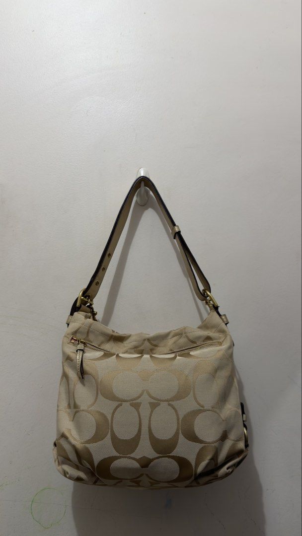 Coach Carly Hobo Bag (Category: Luxury Bags & Wallets) located in Manila. Submitted by coffeepanda1234 (Listing ID 1469090375, Image 2). Description: Sign of use only.