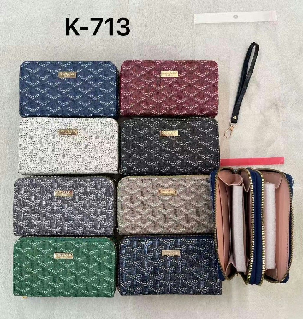 Coach Double Zip Wallet with Wrist Strap K-7563 (Category: Wallets & Card holders) located in Manila. Submitted by jonalyn19 (Listing ID 1468946418, Image 2). Description: - Authentic Coach double zip wallet - Available in multiple gorgeous color options - Includes a convenient detachable wrist strap - Interior features card slots, slip pockets, and a middle zip compartment - Beautiful gold-tone hardware with front horse and carriage logo - Keeps