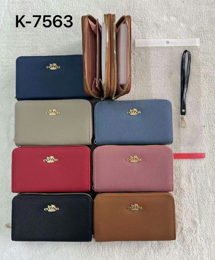 Coach Double Zip Wallet with Wrist Strap K-7563 (Category: Wallets & Card holders) located in Manila. Submitted by jonalyn19 (Listing ID 1468946418, Image 1). Description: - Authentic Coach double zip wallet - Available in multiple gorgeous color options - Includes a convenient detachable wrist strap - Interior features card slots, slip pockets, and a middle zip compartment - Beautiful gold-tone hardware with front horse and carriage logo - Keeps