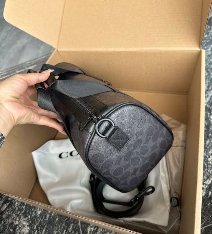 COACH DUFFLE BAG EXPLORER (Category: Sling Bags) located in Pasig City. Submitted by titalana2011991 (Listing ID 1468992307, Image 2). Description: .