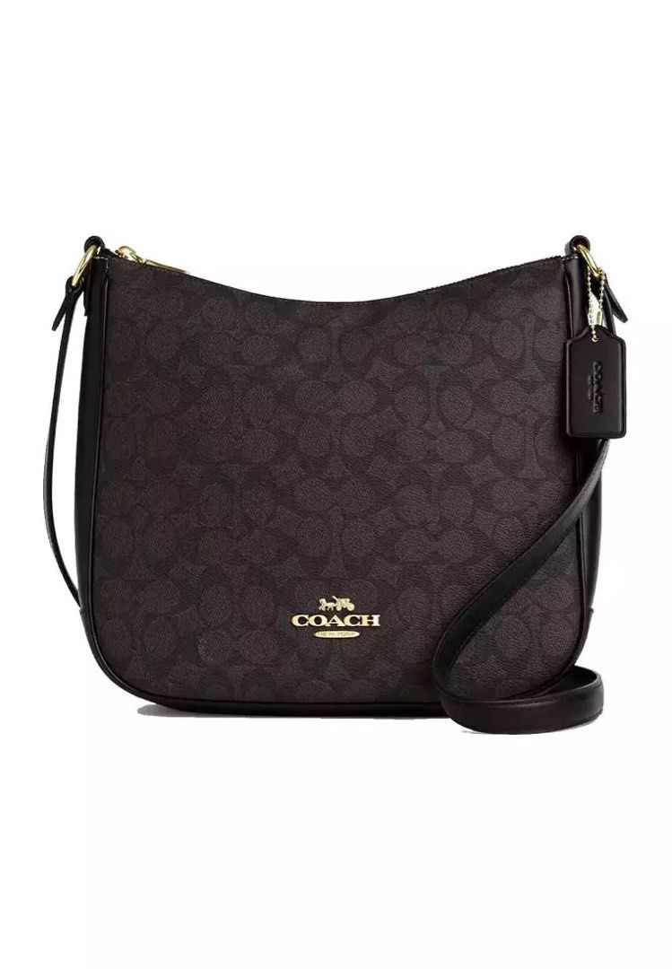 Coach Ellie File Bag (Category: Cross-body Bags) located in Las Pinas. Submitted by pachdeclutters (Listing ID 1469021356, Image 1). Description: COACH ELLIE FILE BAG👜 🏷️ 8500 pesos nego ● Fits your essentials : up to 11” i-Pad, Long Wallet, cosmetic pouch, small umbrella, etc.. ● Dimensions: Length: 10.25” Height: 9.5” Width: 2.75” ● Materials: Signature coated canvas and refined pebble leather Adjustable strap with 21” drop for shoulder or cr