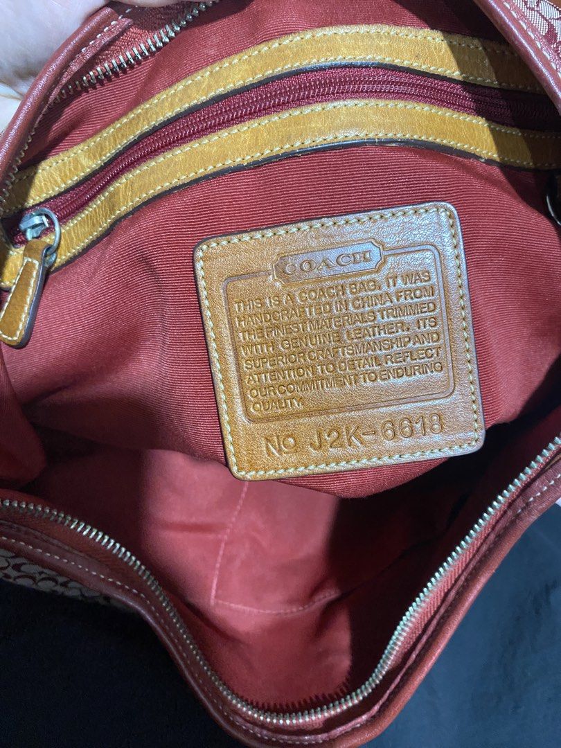 Coach Ergo Red Vintage Bag (Category: Shoulder Bags) located in Muntinlupa City. Submitted by lovefrenzie (Listing ID 1469067731, Image 2). Description: Rare Red Canvas bag Cherry Charm not included With Signs of use Issue: Hiwa sa bawat gilid ng lips pero matibay ang tahi ng canvas at malinis ang leather at canvas. Repainted ang ilalim ng strap pero mas bumagay sa bag since yellow ang orig color ng strap sa ilalim. NEGOTIABLE. Please make an off