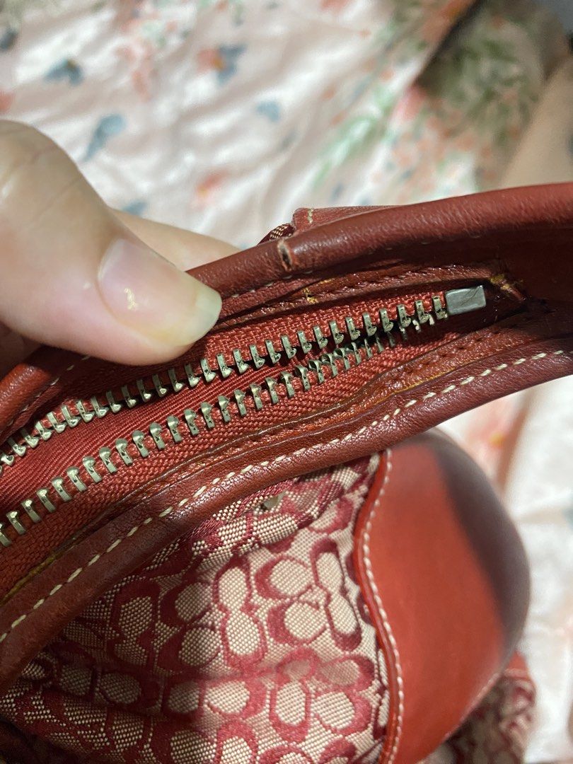 Coach Ergo Red Vintage Bag (Category: Shoulder Bags) located in Muntinlupa City. Submitted by lovefrenzie (Listing ID 1469067731, Image 3). Description: Rare Red Canvas bag Cherry Charm not included With Signs of use Issue: Hiwa sa bawat gilid ng lips pero matibay ang tahi ng canvas at malinis ang leather at canvas. Repainted ang ilalim ng strap pero mas bumagay sa bag since yellow ang orig color ng strap sa ilalim. NEGOTIABLE. Please make an off