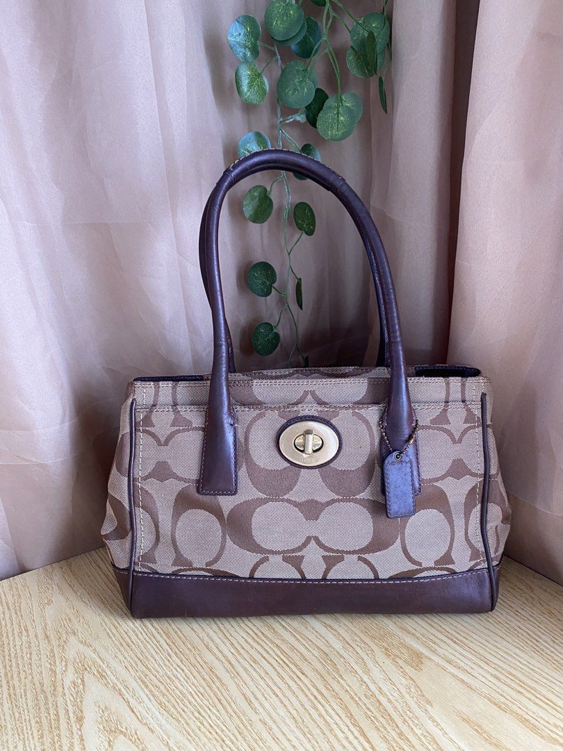 Coach Hampton Shoulder Bag (Category: Shoulder Bags) located in Bulacan. Submitted by red.basket24 (Listing ID 1469080635, Image 1). Description: ❣️AVAILABLE❣️Coach Hampton Shoulder Bag 🏷️Mine: 3,500 php 📌Size: Medium 📌Condition: Good Condition 🌸YKK Zip 🌸Present Creed and Hangtag 🌸no runs/rubs 🌸Silver hardwares Flaw/s: ‼️dirt in interior and exterior canvas material NOTE: 📌Display accessories are not included and for photoshoot purposes o