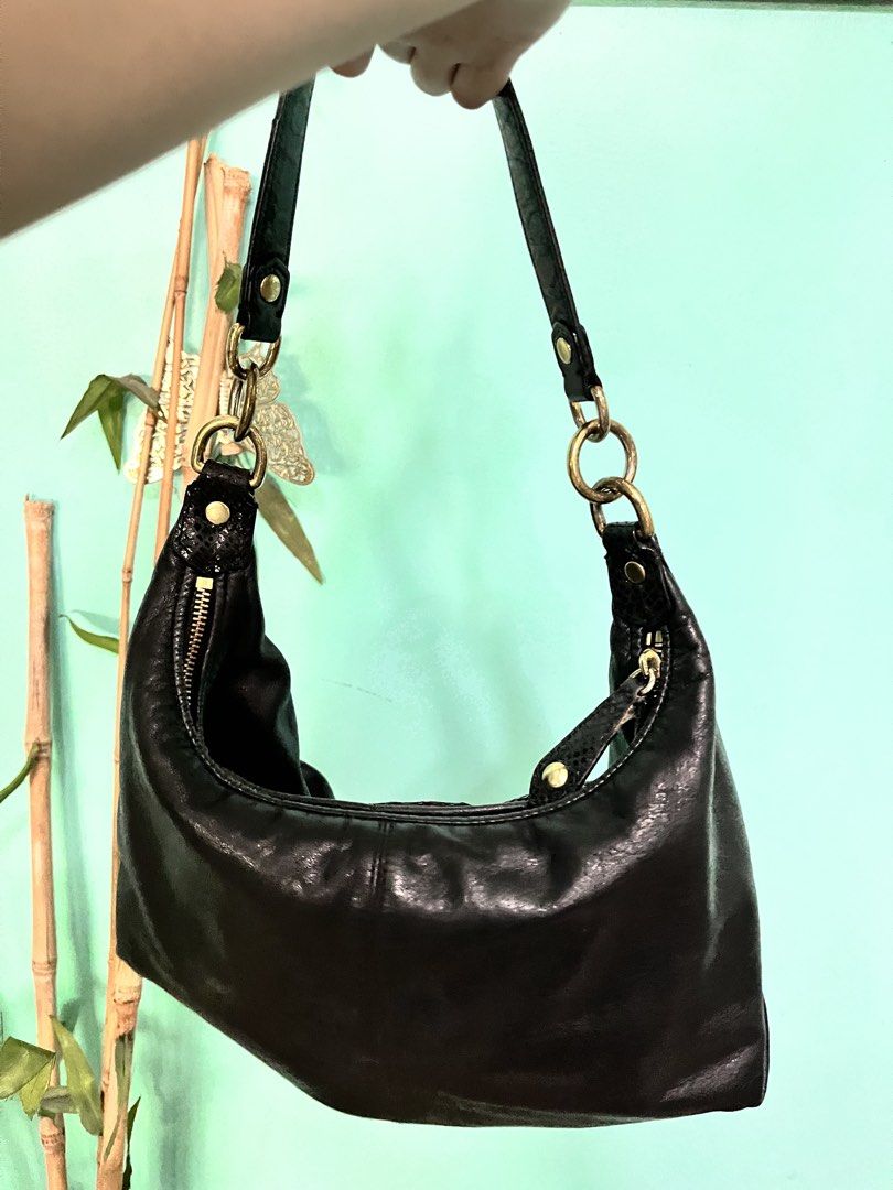Coach Hobo or Soho (Category: Luxury Bags & Wallets) located in Manila. Submitted by clairest29 (Listing ID 1469100350, Image 2). Description: Vintage Coach Soho/Kili Bags 📍Thrifted from Haji Lane in Singapore Hi, I got these bags from thrifting. PM me for more details or a video call option. Open to negotiation 😊.