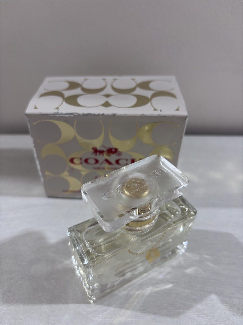 Coach Legacy Eau De Parfum 30ml (Category: Fragrance & Deodorants) located in Caloocan City. Submitted by stuff_shop (Listing ID 1469086973, Image 3). Description: - Authentic Coach Legacy Eau de Parfum - 30ml / 1.0 fl oz bottle (Full, with spray nozzle) - Comes with original gold and white signature C outer box - Beautiful glass bottle featuring frosted C logos, clear cap, and a chic gold charm on a beaded chain - Ideal for daily wear or gifting