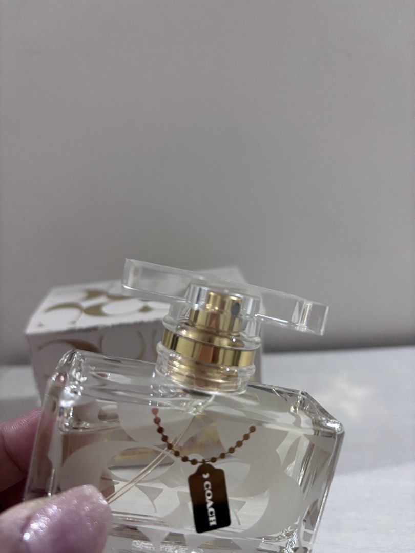 Coach Legacy Eau De Parfum 30ml (Category: Fragrance & Deodorants) located in Caloocan City. Submitted by stuff_shop (Listing ID 1469086973, Image 2). Description: - Authentic Coach Legacy Eau de Parfum - 30ml / 1.0 fl oz bottle (Full, with spray nozzle) - Comes with original gold and white signature C outer box - Beautiful glass bottle featuring frosted C logos, clear cap, and a chic gold charm on a beaded chain - Ideal for daily wear or gifting