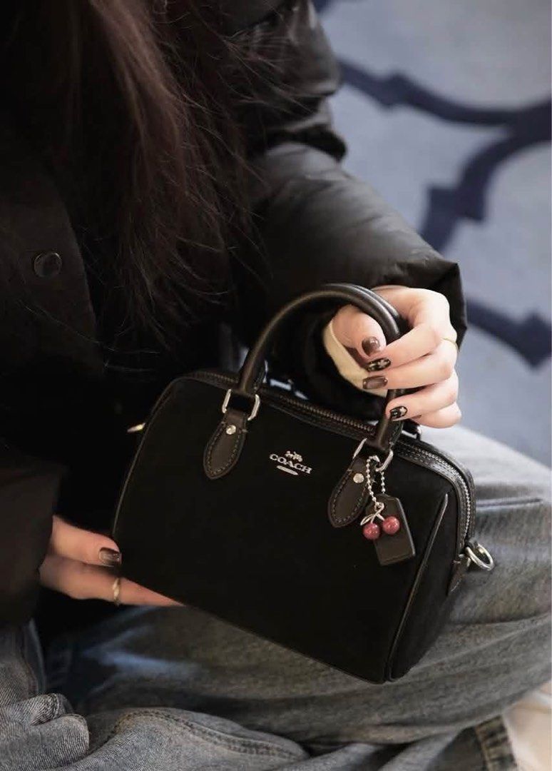 Coach Micro Rowan Black Suede Crossbody Bag (Category: Cross-body Bags) located in Manila. Submitted by msddirectfactoryoutlet (Listing ID 1468993409, Image 1). Description: Size 6" (L) x 4" (H) x 3 1/4" (W) .