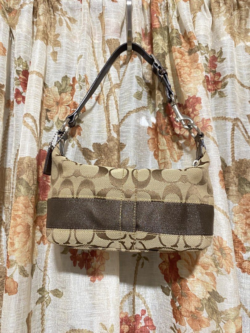 Coach Mini hobo canvas bag (Category: Shoulder Bags) located in Muntinlupa City. Submitted by lovefrenzie (Listing ID 1469102905, Image 1). Description: Brand New condition ❤️ Brown Canvas Bag in mini size Pwede lagyan extender :) Original with ykk zipper and hangtag Please note that this type of coach mini canvas doesn’t have creed. Alabang location .