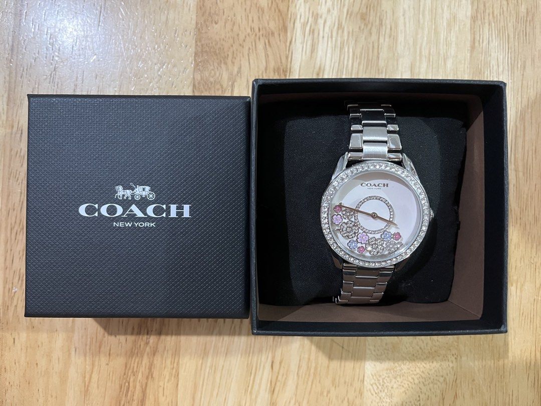 Coach Preston Crystal Accent Watch (Category: Luxury Accessories) located in San Pedro. Submitted by jeikei08 (Listing ID 1469114081, Image 3). Description: • Brand: Coach (Preston Collection) • Model Number: 14503775 • Case Size: 36 mm • Case Material: Stainless steel with crystal-accented bezel • Dial: White sunray dial featuring prairie-inspired crystal floral and circular floating/moving accents • Movement: Quartz • Water Resistance: 3 ATM / 