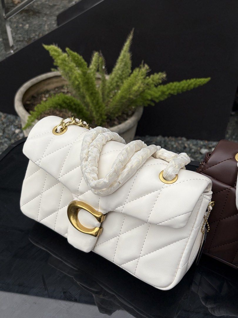 Coach Quilted Tabby Shoulder Bag (Category: Shoulder Bags) located in Cebu City. Submitted by steponmedraws (Listing ID 1468951678, Image 2). Description: Quilted Tabby🤍 Soft, chic, and effortlessly classy. The perfect bag to elevate any look. Available colors: Brown and White 📸 Photos are 100% ours and taken from the actual item. What you see is exactly what you’ll get. We do not use photos from other sellers or suppliers. Disclaimer: We are n