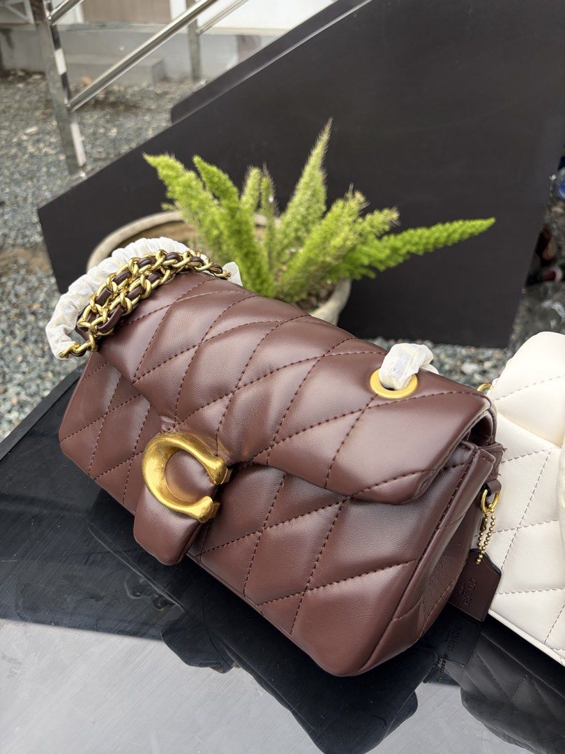 Coach Quilted Tabby Shoulder Bag (Category: Shoulder Bags) located in Cebu City. Submitted by steponmedraws (Listing ID 1468951678, Image 3). Description: Quilted Tabby🤍 Soft, chic, and effortlessly classy. The perfect bag to elevate any look. Available colors: Brown and White 📸 Photos are 100% ours and taken from the actual item. What you see is exactly what you’ll get. We do not use photos from other sellers or suppliers. Disclaimer: We are n