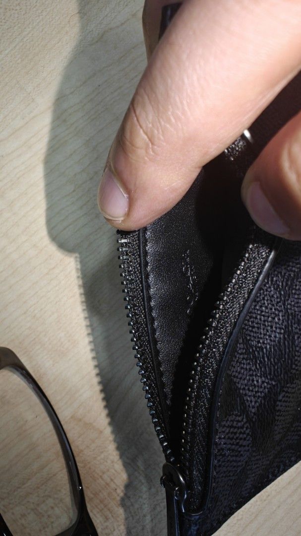 Coach Signature Canvas Zip Card Case Black (Category: Luxury Bags & Wallets) located in Manila. Submitted by _josevicente (Listing ID 1469157592, Image 3). Description: - Brand: Coach - Material: Signature canvas in classic black - Hardware: Gunmetal - Storage: Multiple card slots on one side and a convenient side zippered coin compartment - Design: Compact everyday wallet, sleek and practical Never used. Inspect to appreciate. RFS: Decluttering.