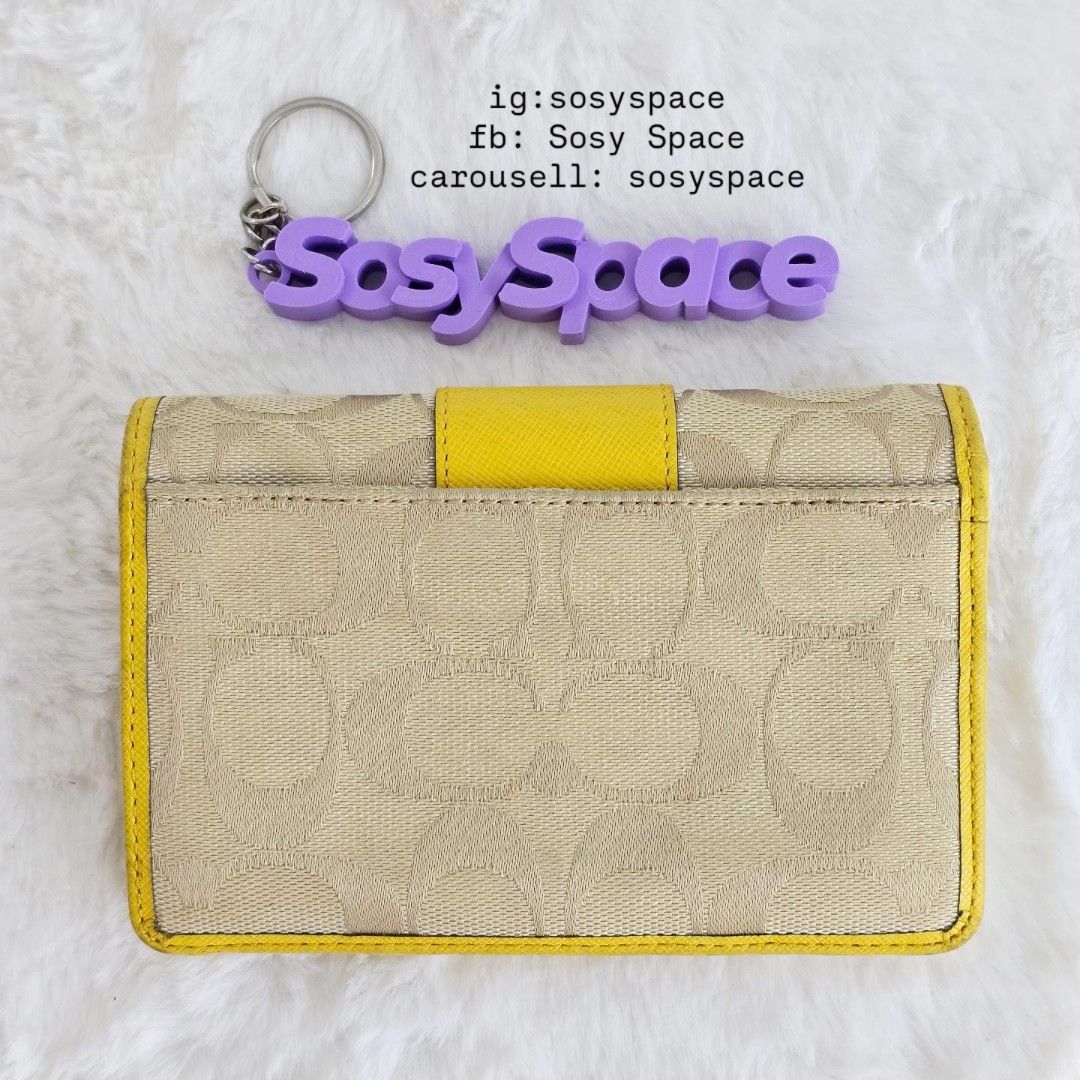 Coach Signature Jacquard Wallet (Category: Luxury Bags & Wallets) located in Lucena. Submitted by sosyspace (Listing ID 1468963552, Image 2). Description: C. O. A. C. H. 01B1P255 Signature Jacquard Bi-fold Wallet Yellow Leather Trim 14.5 x 2.5 x 9.5 cm Condition: PRELOVED has signs of use minor recoloring and cleaning to be pristine no bad odors, no stickiness, no cracking still in very good condition for me for a vintage piece Steal Deal Price: 