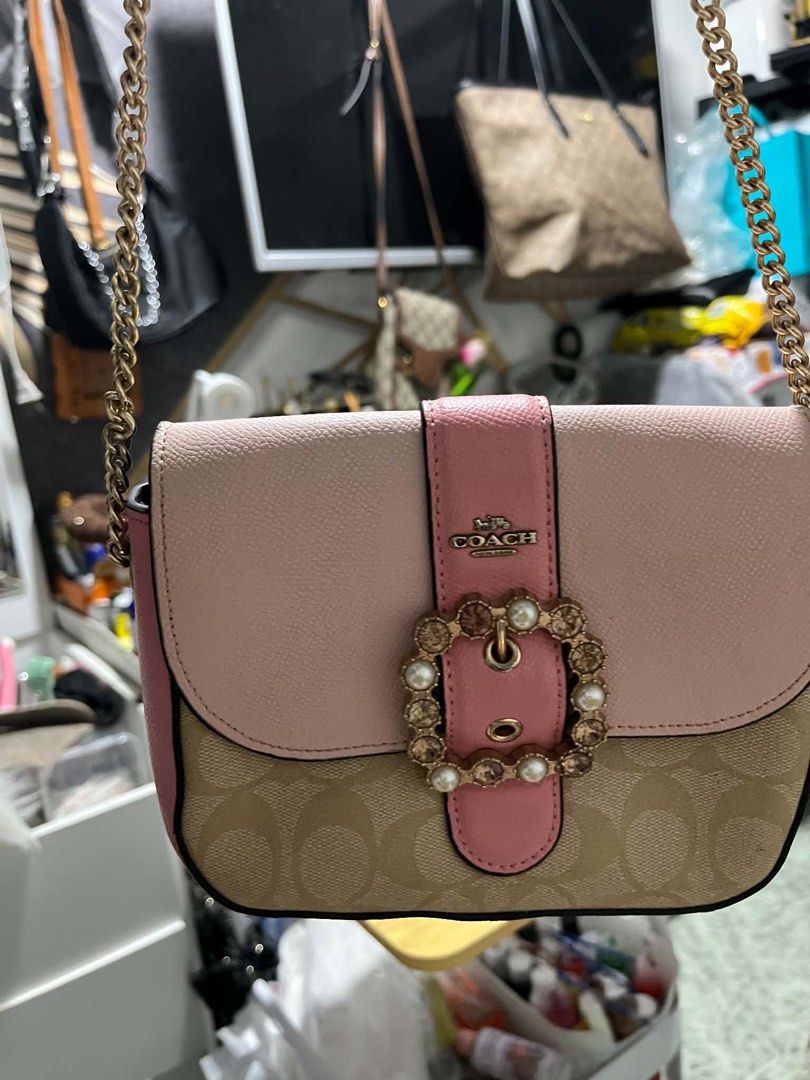 Coach sling bag (Category: Cross-body Bags) located in Caloocan City. Submitted by trebdy01 (Listing ID 1469077883, Image 1). Description: .