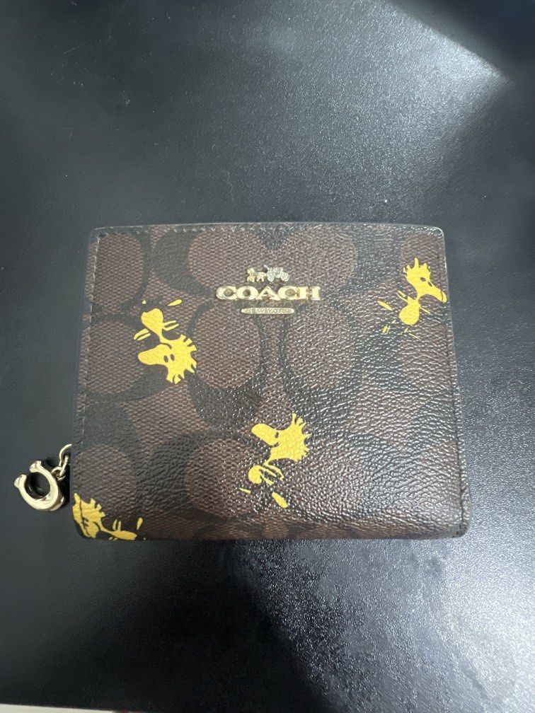 Coach Snoopy Wallet Limited Edition (Category: Luxury Bags & Wallets) located in Manila. Submitted by mahaechn (Listing ID 1469066033, Image 1). Description: Coach Snoopy Wallet for Sale! 🤎 Condition: Good as new RFS: need funds Location: Lancaster, General Trias, Cavite or Adamson University, Manila MOD : Lalamove or Pick up (buyer shoulders df) 💌 PM me for more details and inquiries!.