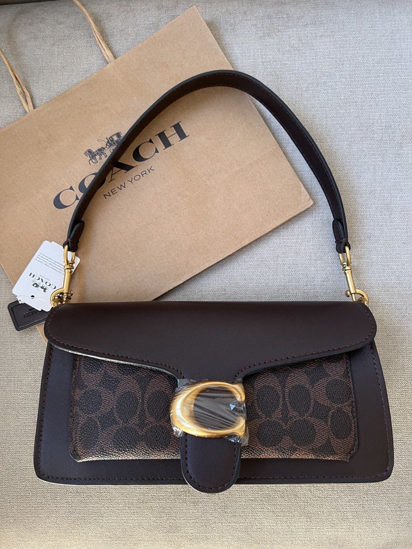 Coach Tabby 26 Classic (Category: Shoulder Bags) located in Manila. Submitted by orsaljoce25536 (Listing ID 1469080118, Image 3). Description: - 100% Authentic Coach Tabby shoulder bag - Available in versatile colors, solid pebble leather, and signature canvas finishes - Elegant gold-tone hardware and secure signature C push-lock closure - Includes a detachable shoulder strap for versatile styling (shoulder or crossbody) - Practical exterior slip
