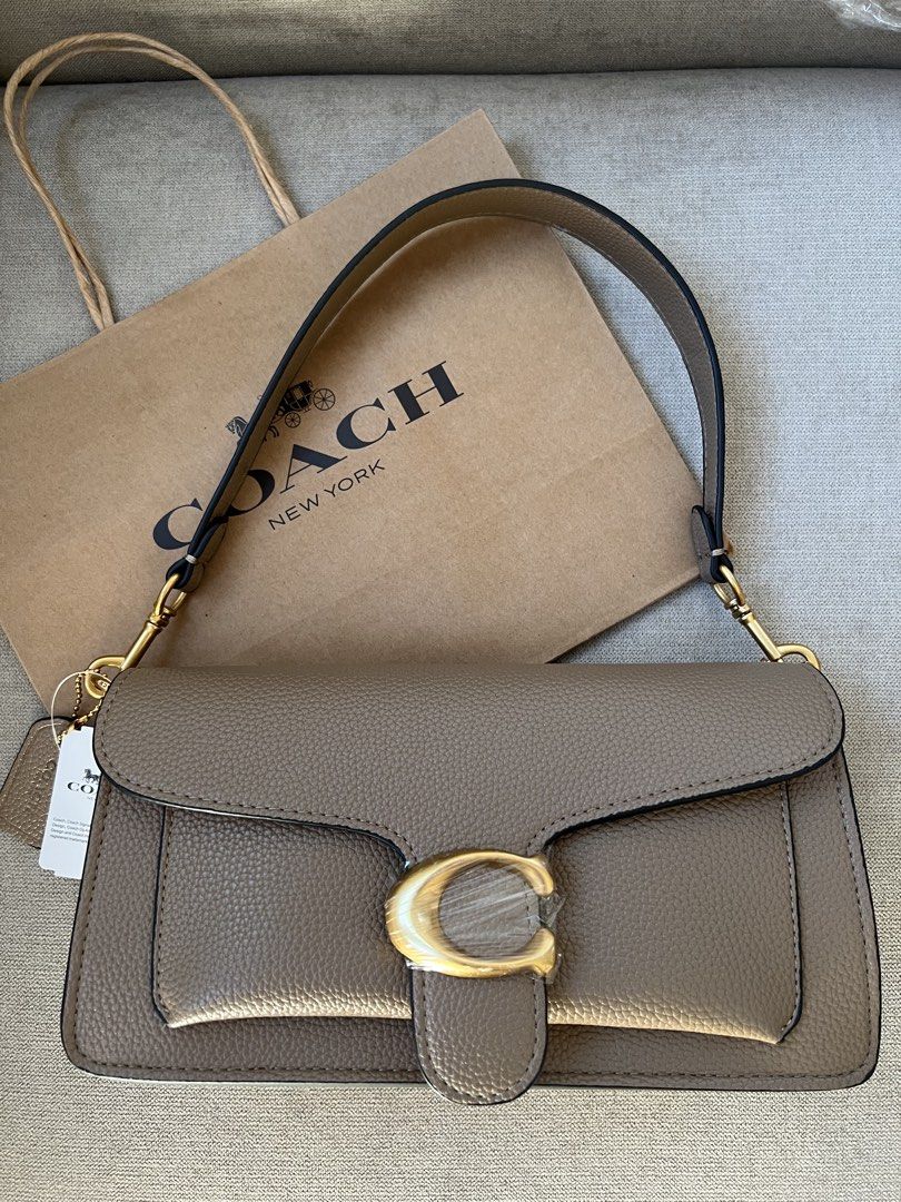 Coach Tabby 26 Classic (Category: Shoulder Bags) located in Manila. Submitted by orsaljoce25536 (Listing ID 1469080118, Image 2). Description: - 100% Authentic Coach Tabby shoulder bag - Available in versatile colors, solid pebble leather, and signature canvas finishes - Elegant gold-tone hardware and secure signature C push-lock closure - Includes a detachable shoulder strap for versatile styling (shoulder or crossbody) - Practical exterior slip