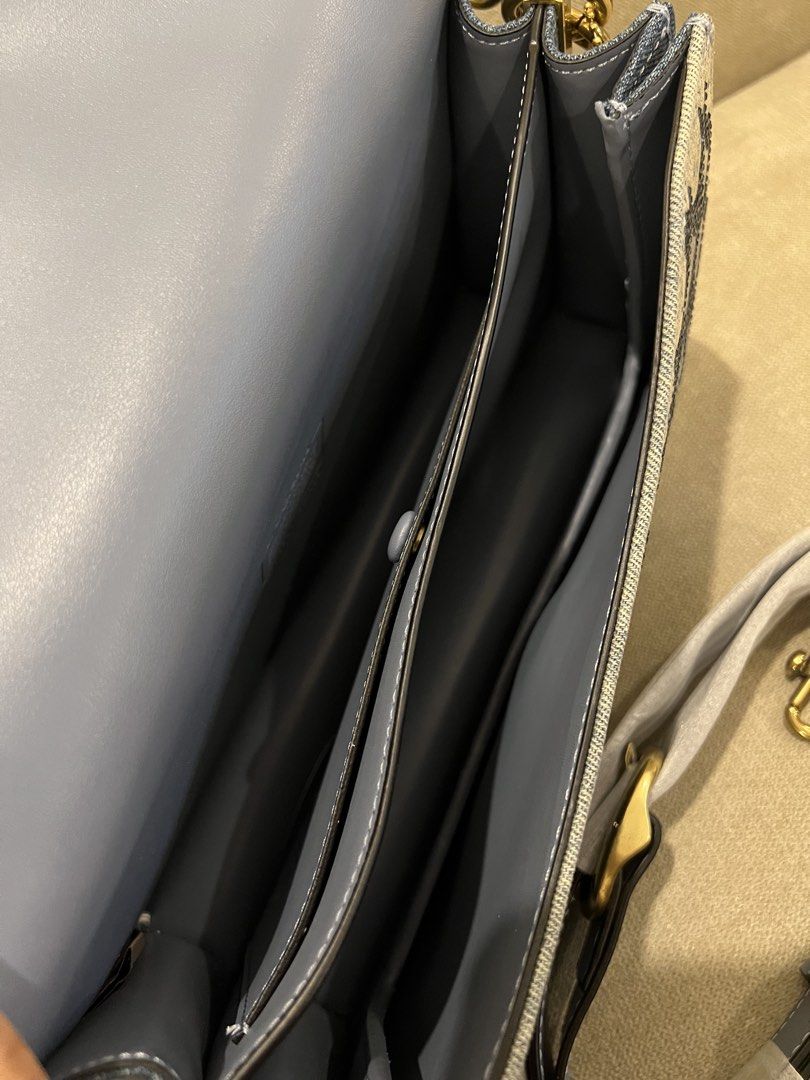 Coach Tabby 26 in Denim Crystal (Category: Luxury Bags & Wallets) located in Manila. Submitted by orsaljoce25536 (Listing ID 1469010596, Image 2). Description: - Brand: Coach - Style: Tabby Shoulder Bag - Material: Blue denim with crystal embellishments and grey-blue leather lining - Hardware: Brass with iconic C clasp - Interior: Structured with multiple compartments - Condition: Brand new with store tags attached - Inclusions: Original detachab
