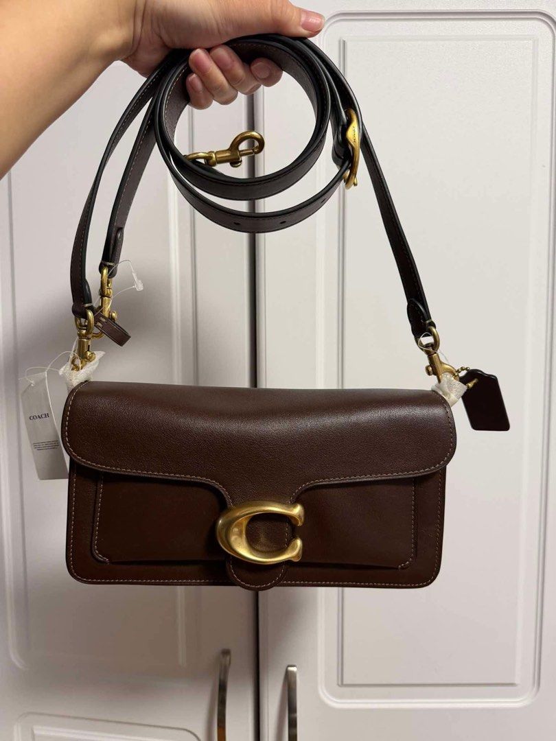 Coach Soft Tabby Shoulder Bag 26 Maple Brown (Category: Shoulder Bags) located in Manila. Submitted by kaitrend (Listing ID 1468938648, Image 2). Description: - Brand: Coach - Model: Tabby Shoulder Bag 26 - Color: Maple - Material: Natural grain leather with brass hardware - Condition: Brand new, unused with original stuffing and protective wrappings - Features: Detachable straps for shoulder or crossbody wear - Inclusions: Dust bag and retail ta