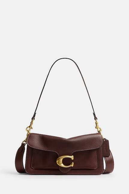 Coach Soft Tabby Shoulder Bag 26 Maple Brown (Category: Shoulder Bags) located in Manila. Submitted by kaitrend (Listing ID 1468938648, Image 1). Description: - Brand: Coach - Model: Tabby Shoulder Bag 26 - Color: Maple - Material: Natural grain leather with brass hardware - Condition: Brand new, unused with original stuffing and protective wrappings - Features: Detachable straps for shoulder or crossbody wear - Inclusions: Dust bag and retail ta