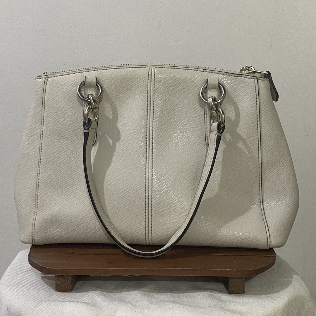 Coach Mini Christie Carryall (Category: Luxury Bags & Wallets) located in Paranaque City. Submitted by howyouwearit (Listing ID 1469048262, Image 3). Description: Coach Christie Carryall in crossgrain leather - so pretty in person. Can be used for formal events. One of the bags I wish I can keep. - already cleaned and polished. Flaw/s: - no hangtag - fading metal platings - inner cloth stains, can’t properly clean it because it’s sewn into the ba