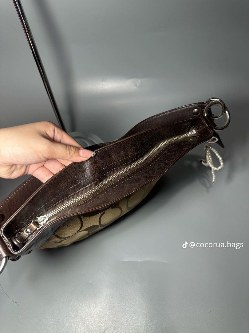 Coach Zoe (Category: Luxury Bags & Wallets) located in Manila. Submitted by cocorua.bags (Listing ID 1469013871, Image 3). Description: [Pre-owned item — please expect normal signs of previous use.] ✧･ﾟ: NOTES :･ﾟ✧ -Please see all photos for the item’s actual condition. Close-up photos of visible signs of use and imperfections are included for transparency. Kindly review all photos carefully before purchasing. -Always authenticate. ♡ DISCLAIMER T