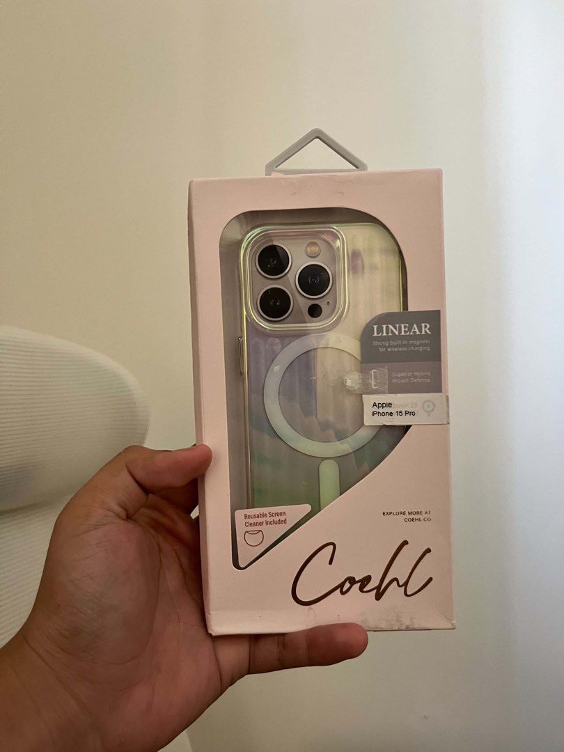 Coehl Linear iPhone 15 Pro Case (Category: Cases & Sleeves) located in Manila. Submitted by oohmrzzz (Listing ID 1468950824, Image 1). Description: - Brand: Coehl Linear - Compatibility: iPhone 15 Pro - Design: Stylish iridescent gradient finish - Feature: Strong built-in magnetic ring for wireless MagSafe charging - Condition: Brand new in original packaging - Inclusions: Reusable screen cleaner included inside - Meetup: Available at SM City Sta