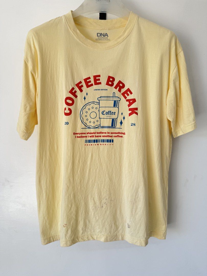Coffee shirt☕️ (Category: Tshirts & Polo Shirts ) located in Quezon City. Submitted by satisfied_buyer (Listing ID 1468947475, Image 1). Description: Coffee shirt for coffee lovers Issue: with visible stains Shoulders 49 Chest 52 length 66.
