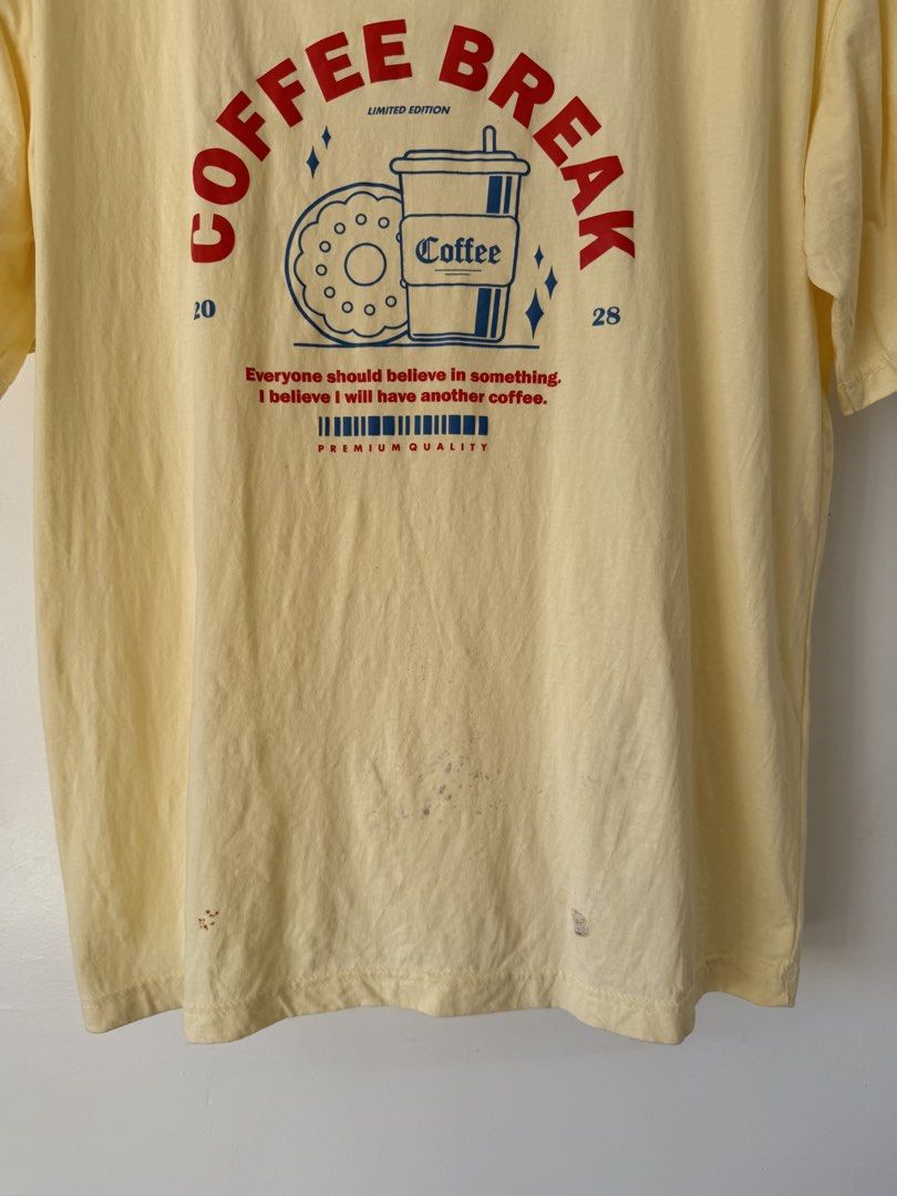 Coffee shirt☕️ (Category: Tshirts & Polo Shirts ) located in Quezon City. Submitted by satisfied_buyer (Listing ID 1468947475, Image 3). Description: Coffee shirt for coffee lovers Issue: with visible stains Shoulders 49 Chest 52 length 66.