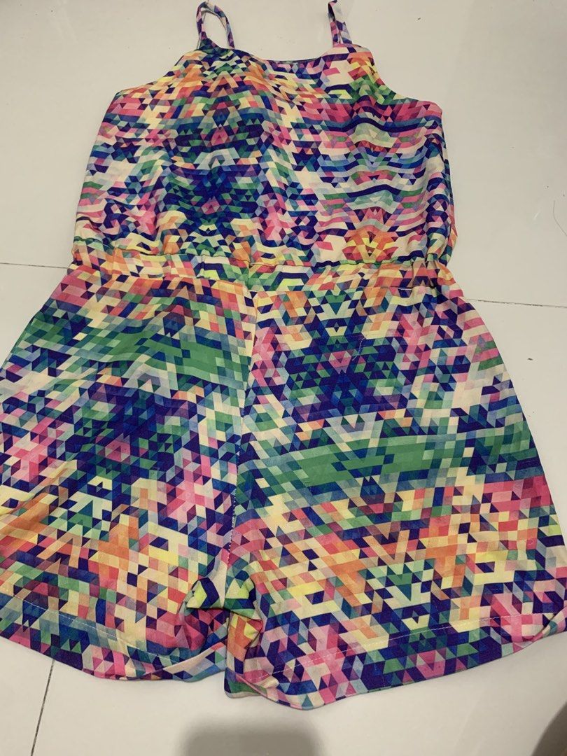 Colorful Geometric Print Spaghetti Strap Romper (Category: Rompers) located in Manila. Submitted by mixwearclosetclothingstore (Listing ID 1468954162, Image 1). Description: - Style: Bright geometric mosaic print romper - Colors: Pink, blue, green, and yellow - Fit: Thin spaghetti straps, scooped neckline, and elastic waistband for a defined fit - Fabric: Lightweight and breathable, ideal for warm weather or beach trips - Bottom: Relaxed drape sh
