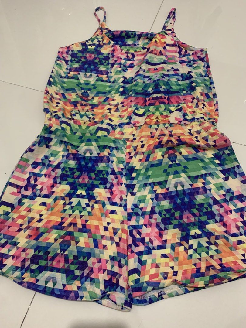 Colorful Geometric Print Spaghetti Strap Romper (Category: Rompers) located in Manila. Submitted by mixwearclosetclothingstore (Listing ID 1468954162, Image 2). Description: - Style: Bright geometric mosaic print romper - Colors: Pink, blue, green, and yellow - Fit: Thin spaghetti straps, scooped neckline, and elastic waistband for a defined fit - Fabric: Lightweight and breathable, ideal for warm weather or beach trips - Bottom: Relaxed drape sh