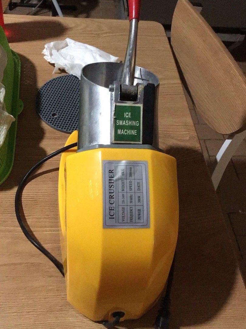 Commercial Electric Ice Crusher Machine Yellow (Category: Juicers, Blenders & Grinders) located in Quezon City. Submitted by rolenalma (Listing ID 1469106560, Image 1). Description: - Vibrant yellow heavy-duty electric ice crusher (approx. 6kg) - Powerful 500W motor with stainless steel hopper and red handle lever - Plugs into standard wall outlets with a simple side on/off switch - Shaves ice super fast for refreshing drinks and desserts - Clean
