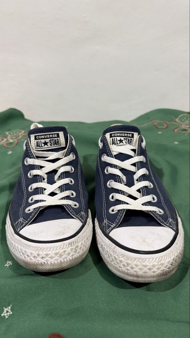 Converse All Star Low Navy Blue Size 8 (Category: Sneakers) located in Manila. Submitted by maligayangthrift (Listing ID 1469049945, Image 2). Description: - Brand: Converse - Model: Chuck Taylor All Star Low Top - Color: Navy Blue - Size: Men's US 8 / Women's US 10 / UK 8 / EUR 41.5 / 26.5 CM - Material: Classic canvas upper with rubber toe caps and white laces - Condition: Normal wear on soles and toe caps - Origin: Made in Vietnam - Perfect fo