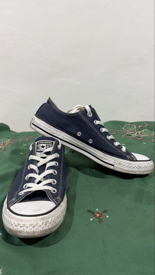Converse All Star Low Navy Blue Size 8 (Category: Sneakers) located in Manila. Submitted by maligayangthrift (Listing ID 1469049945, Image 1). Description: - Brand: Converse - Model: Chuck Taylor All Star Low Top - Color: Navy Blue - Size: Men's US 8 / Women's US 10 / UK 8 / EUR 41.5 / 26.5 CM - Material: Classic canvas upper with rubber toe caps and white laces - Condition: Normal wear on soles and toe caps - Origin: Made in Vietnam - Perfect fo