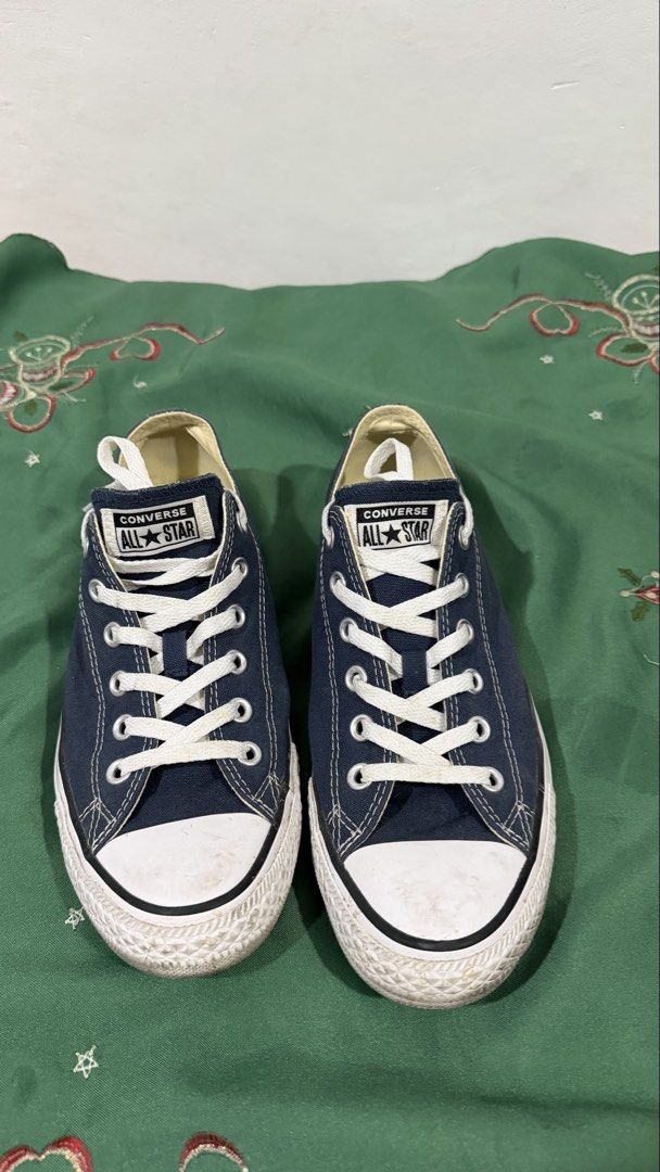 Converse All Star Low Navy Blue Size 8 (Category: Sneakers) located in Manila. Submitted by maligayangthrift (Listing ID 1469049945, Image 3). Description: - Brand: Converse - Model: Chuck Taylor All Star Low Top - Color: Navy Blue - Size: Men's US 8 / Women's US 10 / UK 8 / EUR 41.5 / 26.5 CM - Material: Classic canvas upper with rubber toe caps and white laces - Condition: Normal wear on soles and toe caps - Origin: Made in Vietnam - Perfect fo