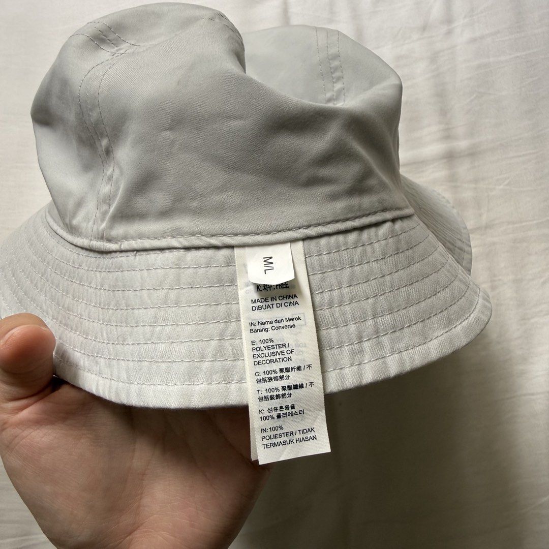 Converse Chuck Taylor All Star Bucket Hat M/L (Category: Caps & Hats) located in Pasig City. Submitted by notshynotmeee (Listing ID 1468959982, Image 3). Description: - Brand: Converse - Design: Reversible (Grey and Light Blue) - Details: Classic Chuck Taylor All Star patch on the front - Size: M/L - Material: 100% Polyester - Condition: Clean with original tags attached (Model: 10024855-A05-416).