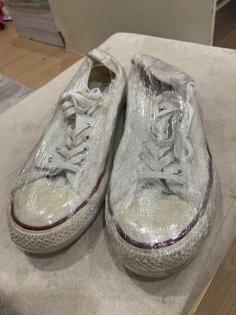Converse chuck taylors white low cut (Category: Sneakers) located in Manila. Submitted by bedlambuzz (Listing ID 1469051288, Image 2). Description: Wysiwg No box Plastic wrapped for storage Worn as described Clean soles as I keep my shoes clean.