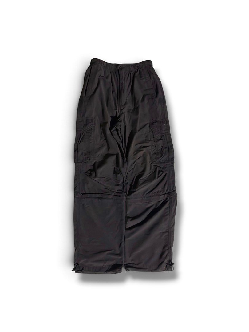 Converse Convertible Pants (Category: Activewear) located in Manila. Submitted by youngvill (Listing ID 1468797527, Image 1). Description: - Color: Washed black - Closure: Button waist - Pockets: Secure zippered side pockets - Condition: Clean, no major flaws - Ideal for: streetwear outfits.