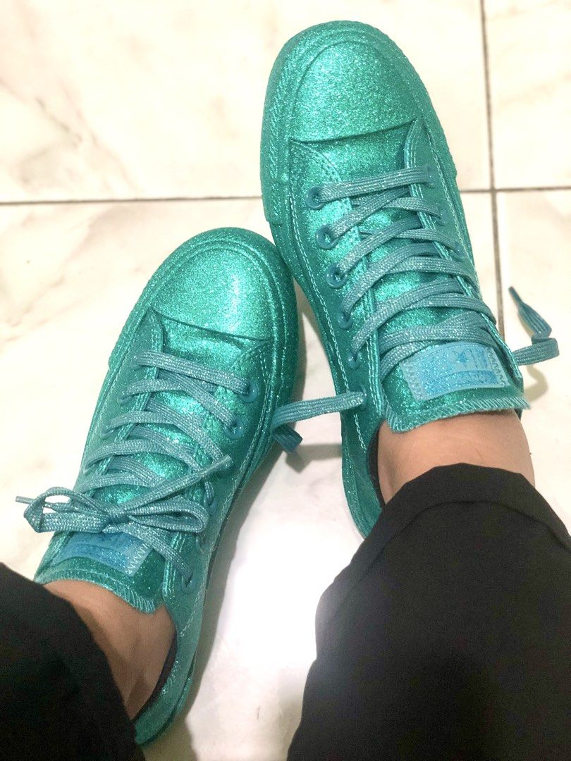 Converse Sparkle Glitter Teal Low-Top Sneakers (Category: Sneakers) located in Caloocan City. Submitted by meg_ssaem (Listing ID 1468947258, Image 2). Description: - Vibrant teal low-top Converse covered in glitter from toe to heel - Matching glitter laces and blue tongue label - Classic rubber toe cap and textured sole - Fun pop of color to brighten up any everyday outfit.