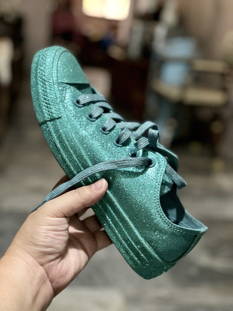 Converse Sparkle Glitter Teal Low-Top Sneakers (Category: Sneakers) located in Caloocan City. Submitted by meg_ssaem (Listing ID 1468947258, Image 3). Description: - Vibrant teal low-top Converse covered in glitter from toe to heel - Matching glitter laces and blue tongue label - Classic rubber toe cap and textured sole - Fun pop of color to brighten up any everyday outfit.