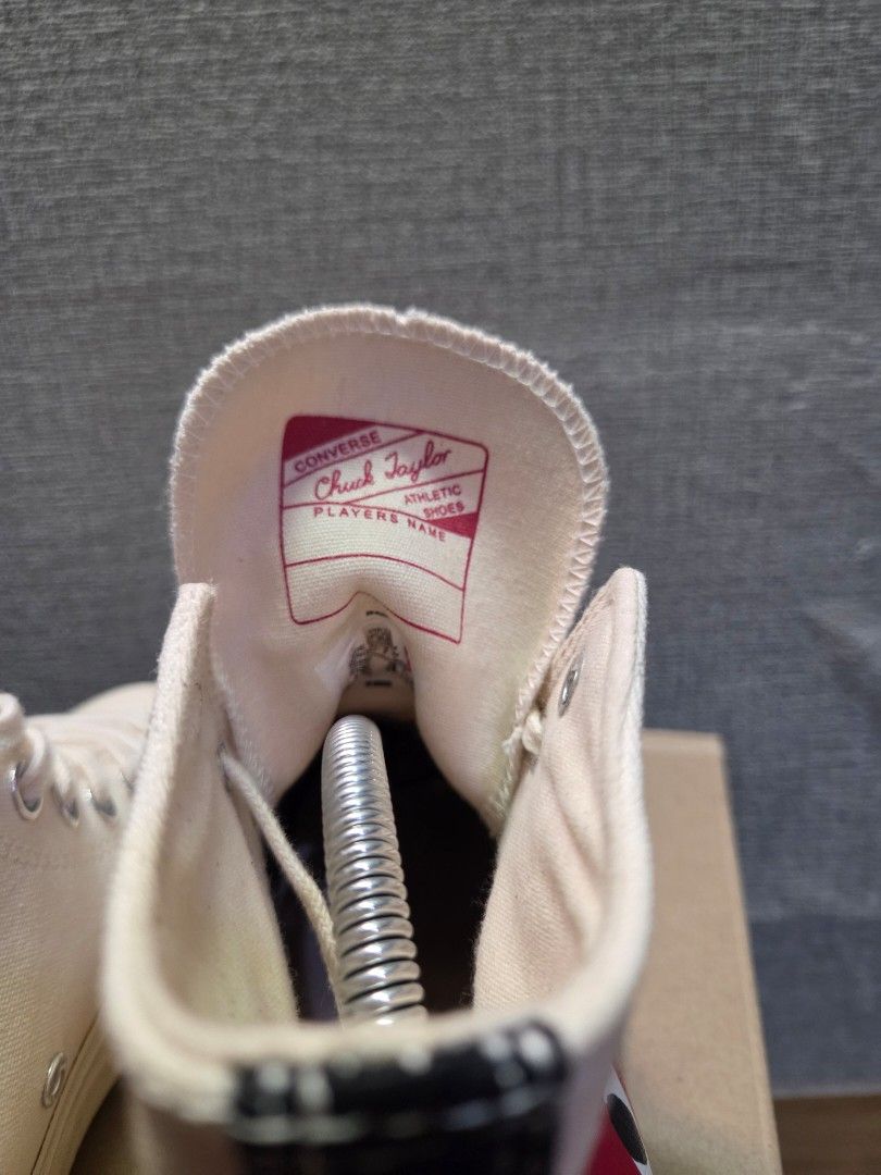 Converse x Comme des Garcons PLAY Chuck 70 High Top (Category: Sneakers) located in Manila. Submitted by isen45 (Listing ID 1469117005, Image 2). Description: - Brand/Model: CDG Play x Converse High-Top Sneakers - Color: Off-White / Milk - Details: Iconic red heart with eyes graphic, black heel stripe, classic All Star ankle patch - Condition: Gently worn, minor discoloration spots on canvas upper - Inclusions: Comes with original box and cream l