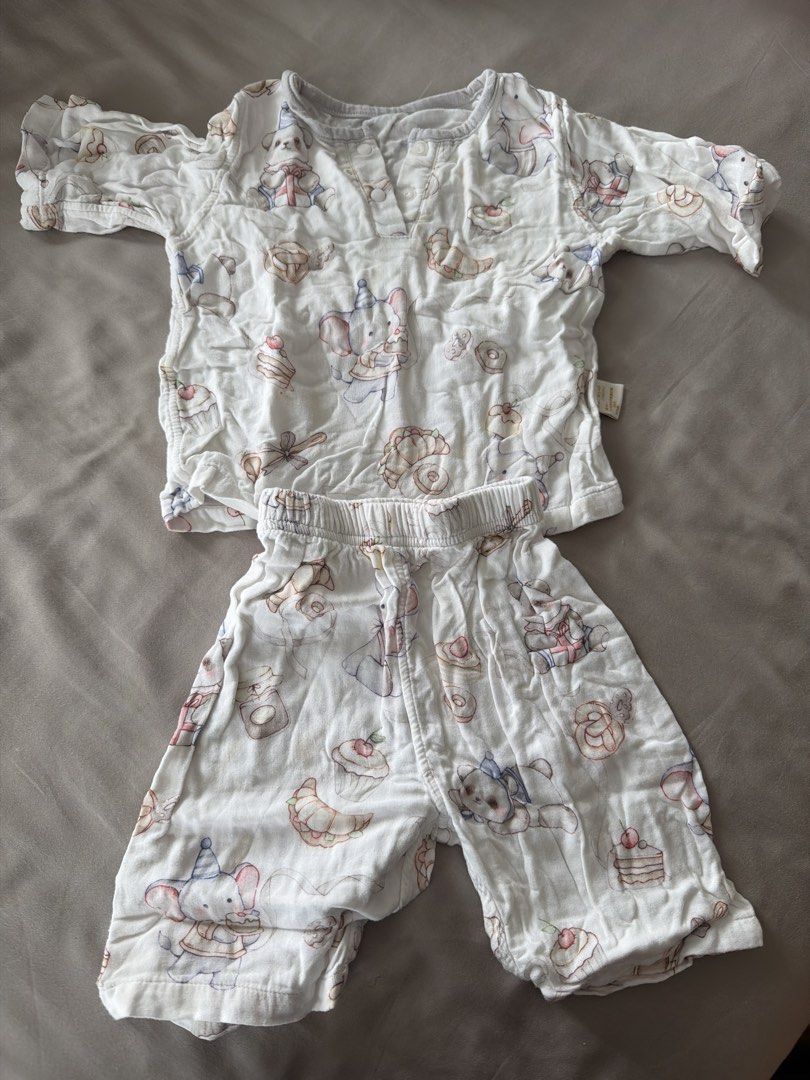 Cotton Toddler Pajama Sets (Category: Babies & Kids Fashion) located in Manila. Submitted by 17thfinds (Listing ID 1468962538, Image 1). Description: Two sets of toddler pyjamas, size 18MTH. One white set with cute animal and dessert prints, plus one pink set covered in adorable cat patterns. Button-up neckline on the tops and elastic waistbands on the shorts. Soft cotton-blend material, easy to wash and wear for bedtime or lounging around the ho