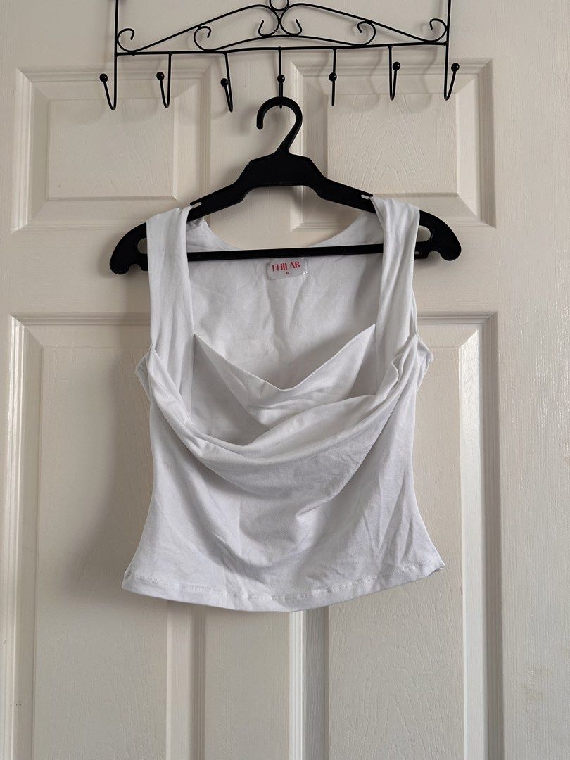 Cowl Square Neck (L-XL) (Category: Sleeveless) located in Bacoor. Submitted by alliabuysandsells (Listing ID 1468964537, Image 1). Description: cowl style square neck crop top fits large - XL no issues also available in black.