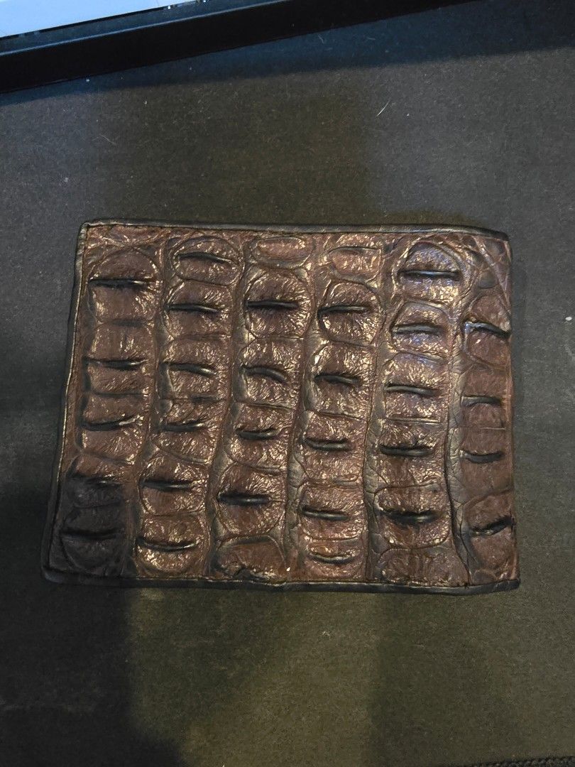 Crocodile Leather Bifold Wallet (Category: Wallets & Card holders) located in Manila. Submitted by dsb1705 (Listing ID 1469098405, Image 2). Description: Crocodile Leather Wallet Price: 3000 PHP (Negotiable) Bought from Bangkok Chatuchak Market at October 2026. Used around 5 times then kept in storage. Genuine crocodile leather (see last pic) RFS: Not my style.