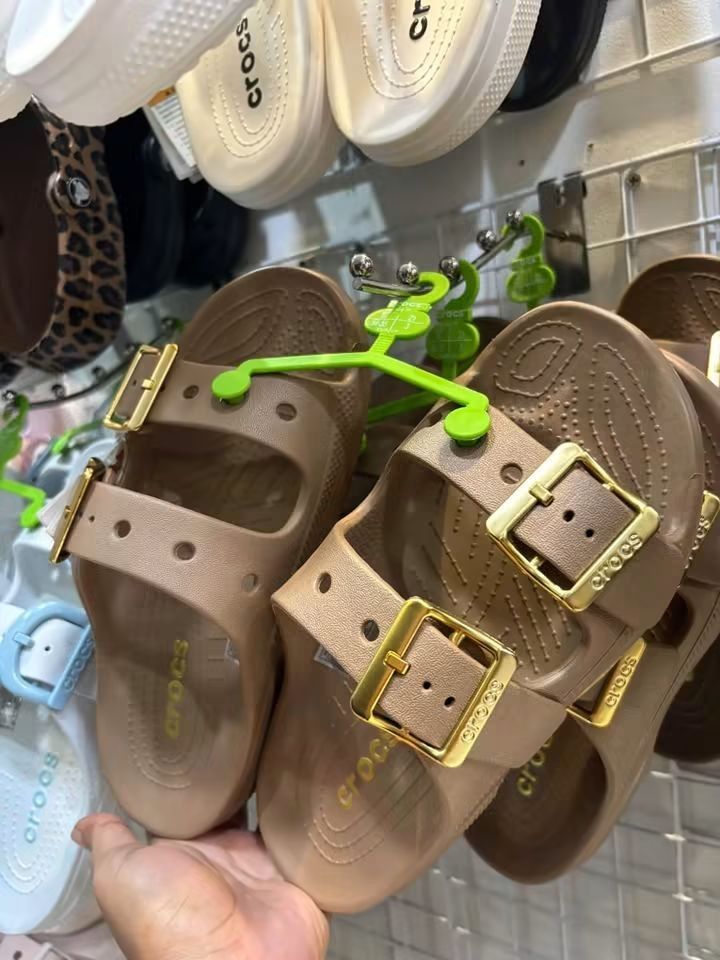 Crocs Brooklyn Buckle Sandals Multiple Colors Available (Category: Flats & Sandals) located in Cebu City. Submitted by madeskartegirl (Listing ID 1468982342, Image 2). Description: - Brand new with tags (BNWT) and original hanging display hooks - Chic double-strap design featuring trendy oversized buckles - Textured footbed provides extra grip and all-day comfort - Available colorways: Black, Brown, White, and Pink.
