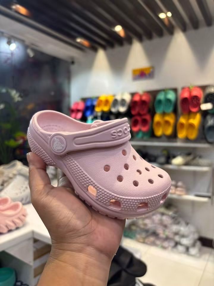 Crocs Classic Clog with Jibbitz Charms (Category: Babies & Kids Fashion) located in Cebu City. Submitted by madeskartegirl (Listing ID 1468982077, Image 1). Description: - Brand new with tags attached - Super comfy and lightweight foam slip-on design - Colors available: Pink and Beige/Cream - Comes pre-decorated with cute Jibbitz charms (butterflies, unicorns, and flowers) - Ideal for stylish, everyday casual wear.