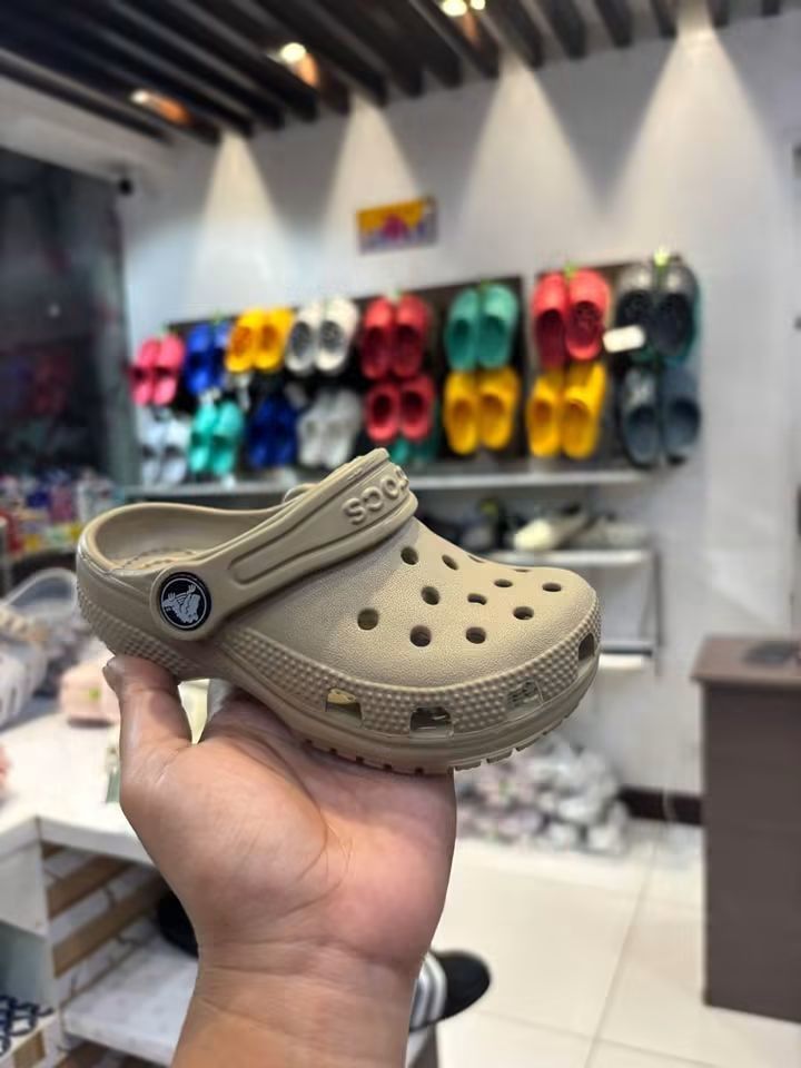 Crocs Classic Clog with Jibbitz Charms (Category: Babies & Kids Fashion) located in Cebu City. Submitted by madeskartegirl (Listing ID 1468982077, Image 2). Description: - Brand new with tags attached - Super comfy and lightweight foam slip-on design - Colors available: Pink and Beige/Cream - Comes pre-decorated with cute Jibbitz charms (butterflies, unicorns, and flowers) - Ideal for stylish, everyday casual wear.