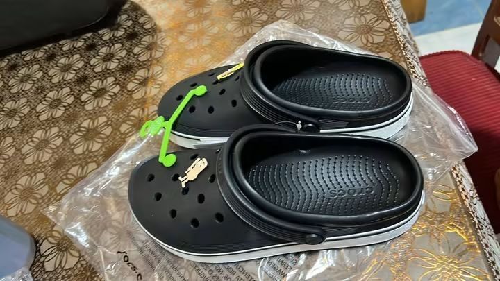 Crocs Clogs Black White with Jibbitz Charms (Category: Slippers and slides) located in Cebu City. Submitted by madeskartegirl (Listing ID 1468980425, Image 1). Description: Size 5-11 available - Brand: Crocs Clogs - Color: Black and White - Condition: Brand new, never worn, pristine condition - Inclusions: Fun Jibbitz charms included, comes with original green plastic hanger tag and original plastic packaging.